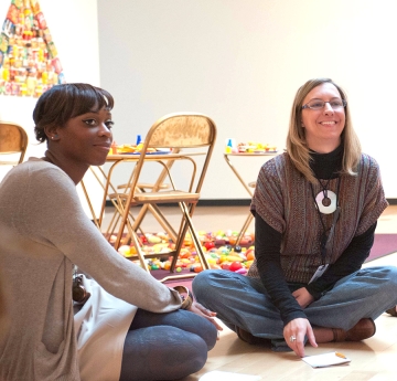 Art education students sitting in a gallery