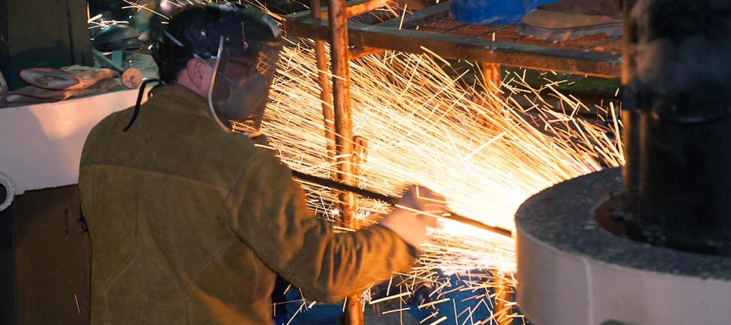 A student working at the Iron Pour